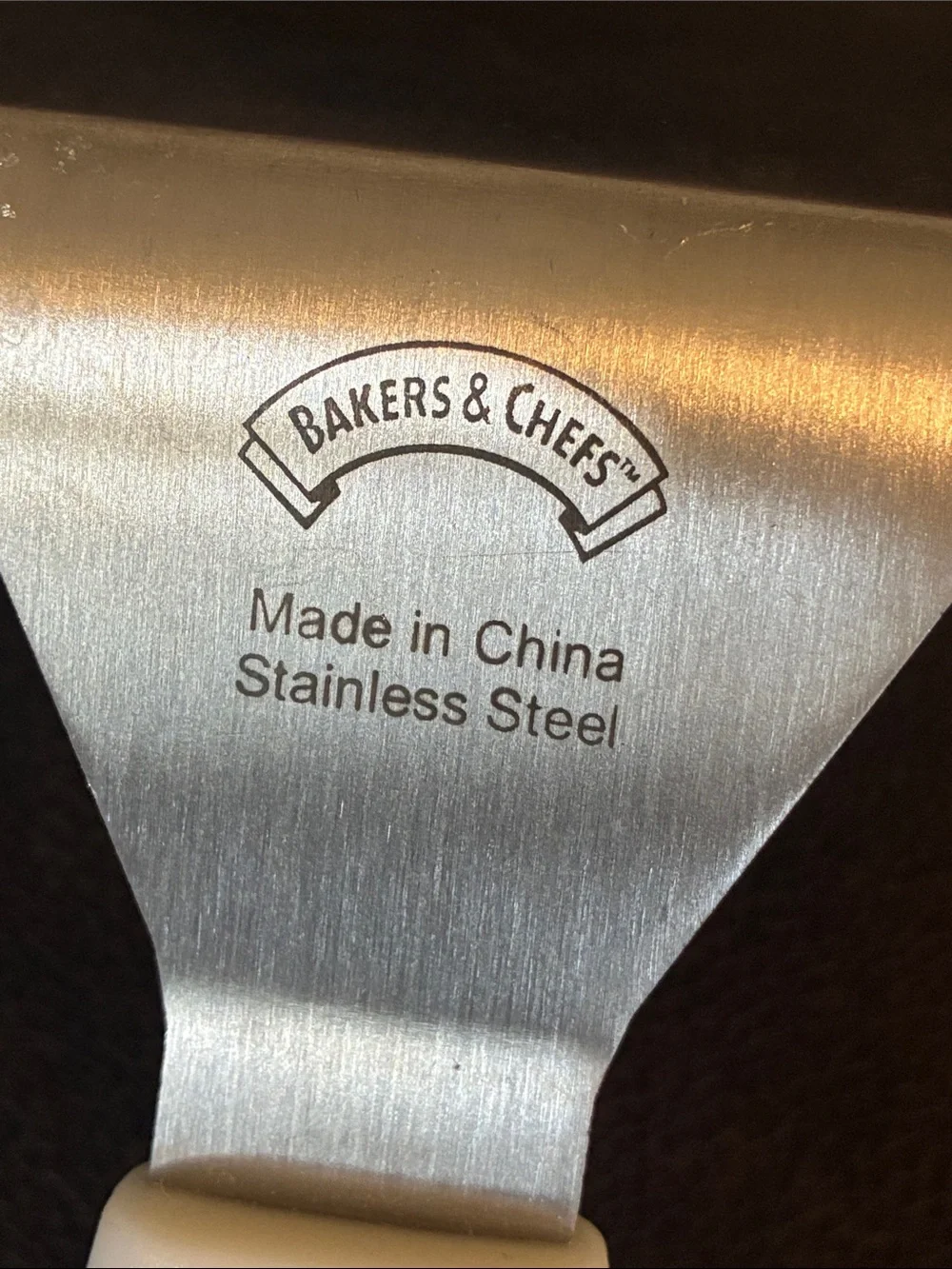 White-Handled Stainless Steel Slotted Turner Spatula